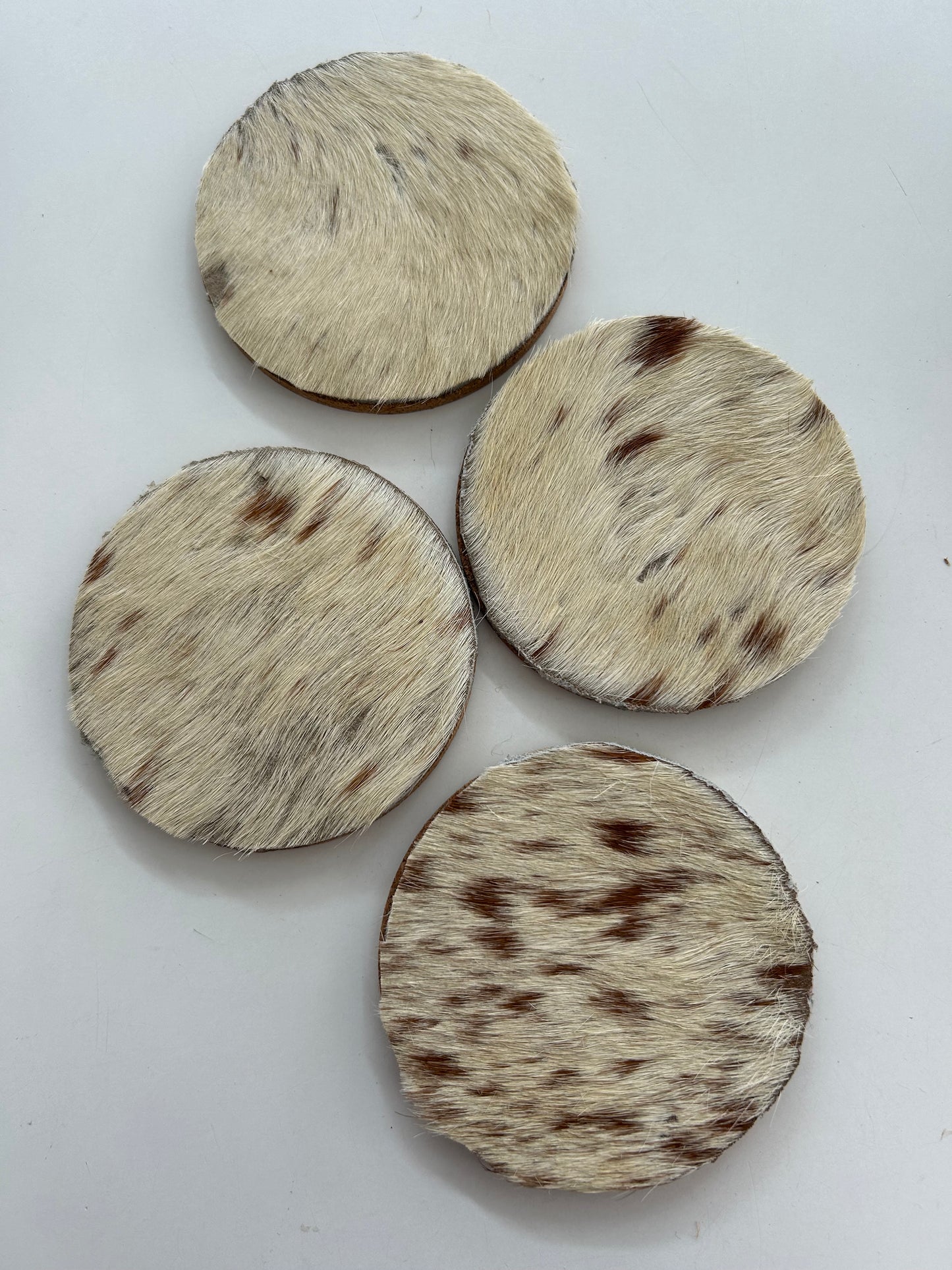 COWHIDE COASTERS 4pk